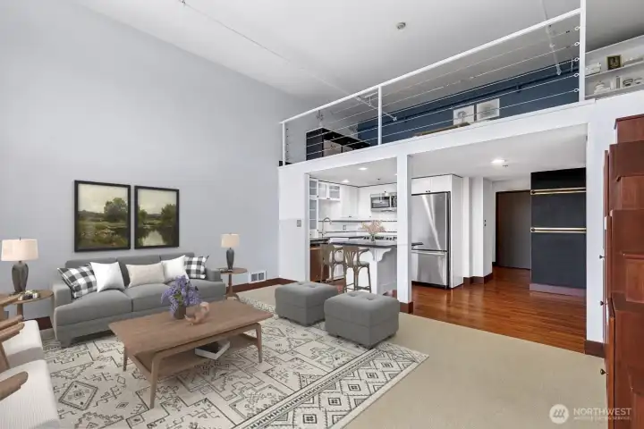 Designed to inspire, this open-concept interior captures both style and functionality. This photo has been virtually staged.