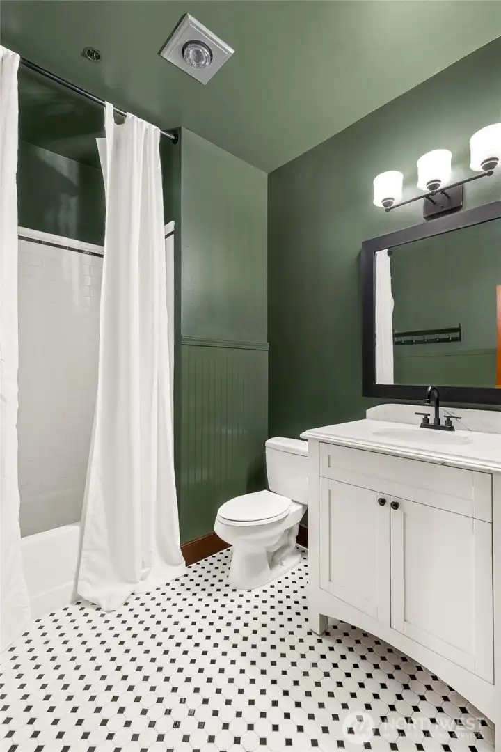 The full bath balances simplicity and elegance with a timeless, enduring style.