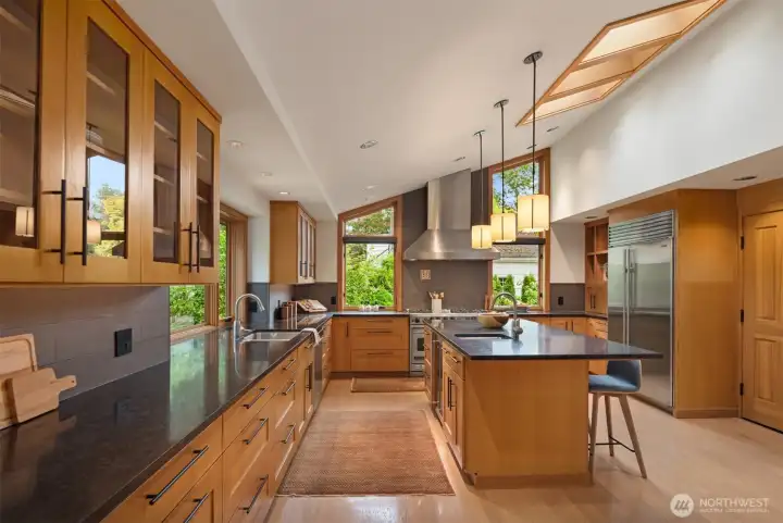 Vaulted ceilings and more skylights in this spacious chef's kitchen with all-day sun from the south-facing windows. Vaulted ceilings and more skylights in this spacious chef's kitchen with all-day sun from the south-facing windows.