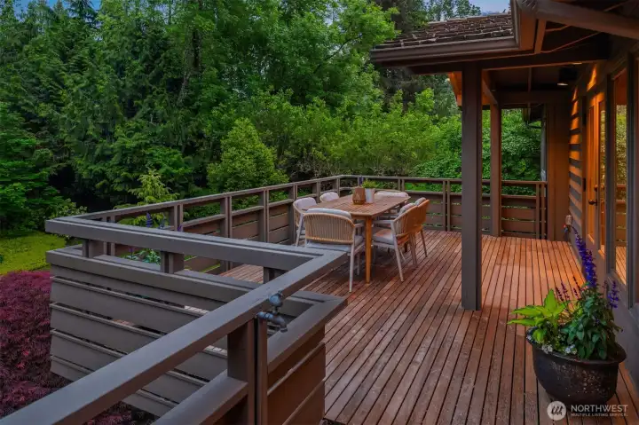 This is where you'll eat all summer long, overlooking the expansive gardens This is where you'll eat all summer long, overlooking the expansive gardens