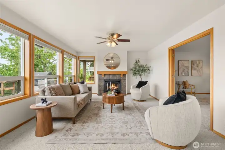 Large family room with picturesque windows that capture all the views