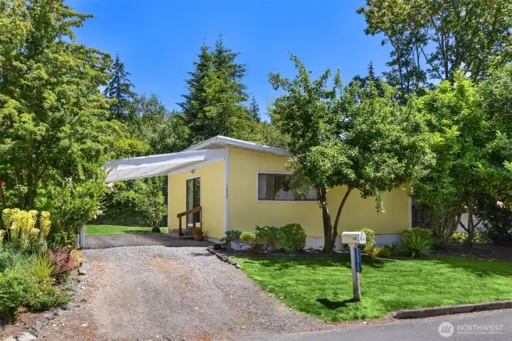 welcome to your new home on Bainbridge Island's coveted south end—an exceptional setting for enjoying the very best of island living.