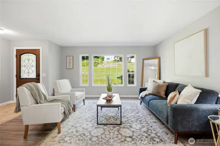Spacious yet cozy, this room is perfect for relaxing or gathering with family and friends. Spacious yet cozy, this room is perfect for relaxing or gathering with family and friends.