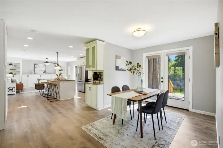 The open layout keeps everyone connected while preparing meals. The open layout keeps everyone connected while preparing meals.