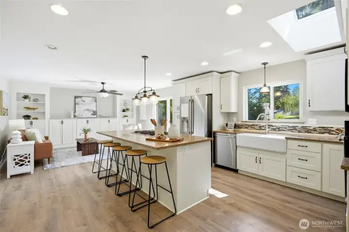 The beautifully designed kitchen features an oversized island perfect for cooking, gathering, and entertaining. The beautifully designed kitchen features an oversized island perfect for cooking, gathering, and entertaining.