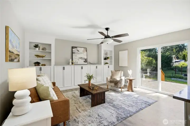 The comfortable family room offers a relaxing retreat for everyday living. Custom built-in cabinetry provides exceptional storage and display space. The comfortable family room offers a relaxing retreat for everyday living. Custom built-in cabinetry provides exceptional storage and display space.