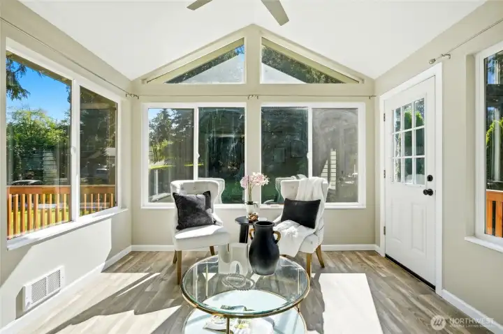 The attached sunroom provides a peaceful space to enjoy every season. Perfect for morning coffee, reading, or simply taking in the backyard views. A versatile bonus space that extends the primary suite. The attached sunroom provides a peaceful space to enjoy every season. Perfect for morning coffee, reading, or simply taking in the backyard views. A versatile bonus space that extends the primary suite.