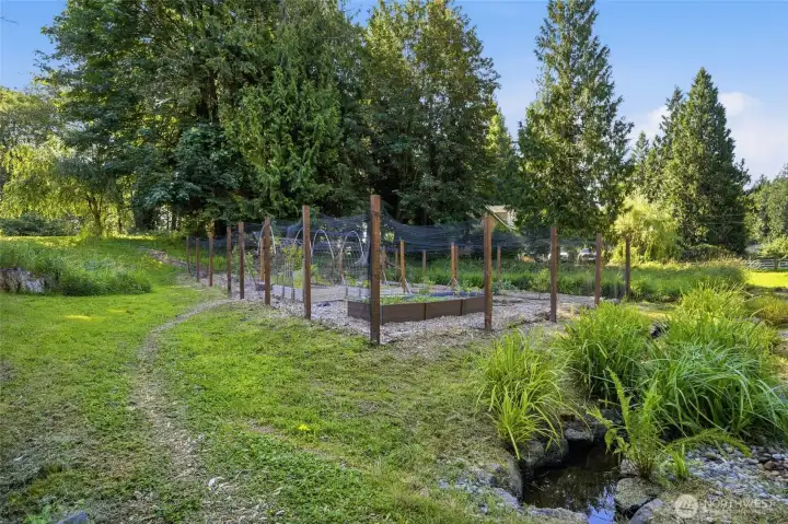 A peaceful stream enhances the property's natural beauty. A peaceful stream enhances the property's natural beauty.