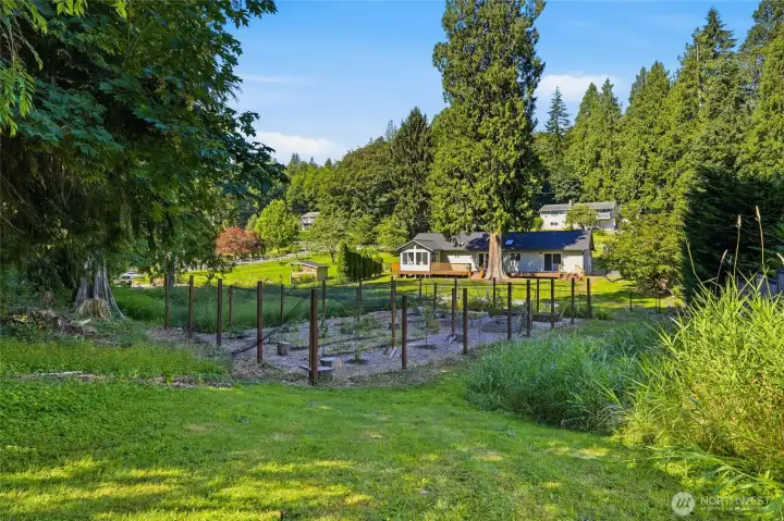 Beautiful mature landscaping enhances the home's inviting character. Beautiful mature landscaping enhances the home's inviting character.