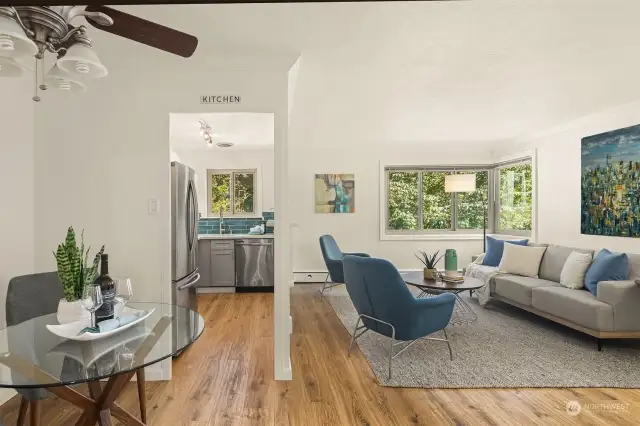 Living room, dining area, and kitchen.