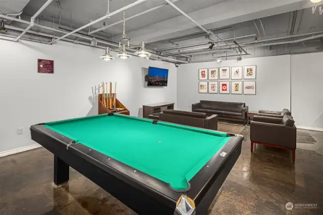 Community room including tv, pool table, and seating area for friends and guests!