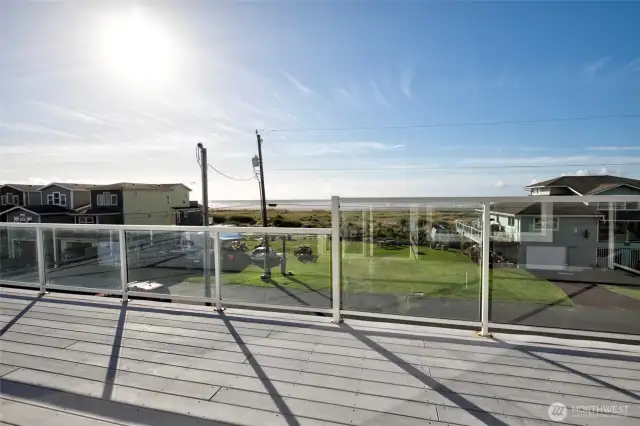 The top floor viewing deck is spectacular! Views and more views! Imagine the amazing sunsets from this home!
