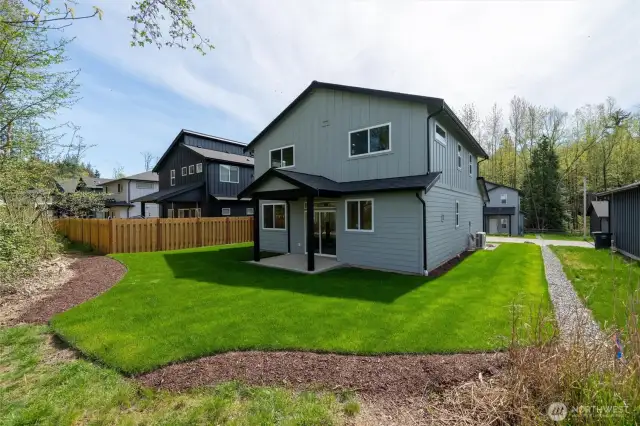 Situated on a flat, sunny lot that backs up to a neighborhood park.