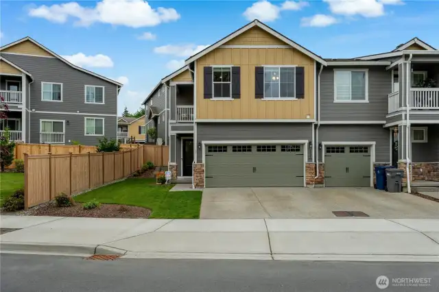 Far left corner lot with 2 car garage.