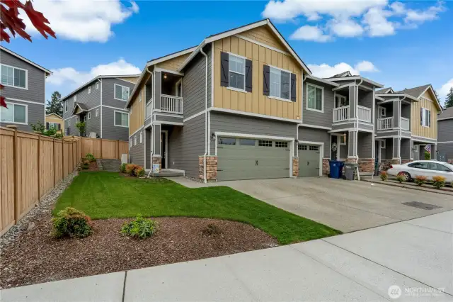 Corner lot with partially fenced yard.