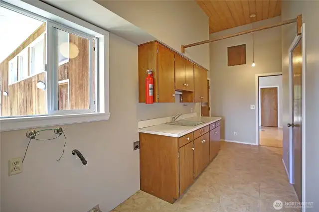Generous main floor laundry/Utility room.  Downstairs has separate laundry.