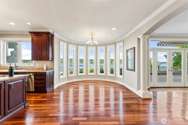Sun-filled kitchen nook-perfect for casual meals with a view and morning coffee by the water.