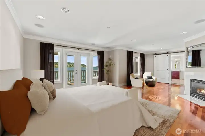 Digitally Staged to inspire. Spacious primary suite with lake light and luxury-envision your personal haven here.