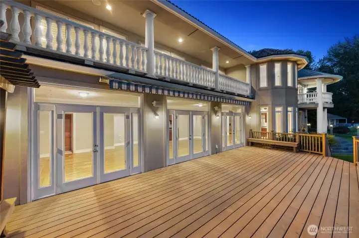 Evenings on the deck. Soft lighting, water reflections, and unforgettable lakefront ambiance.