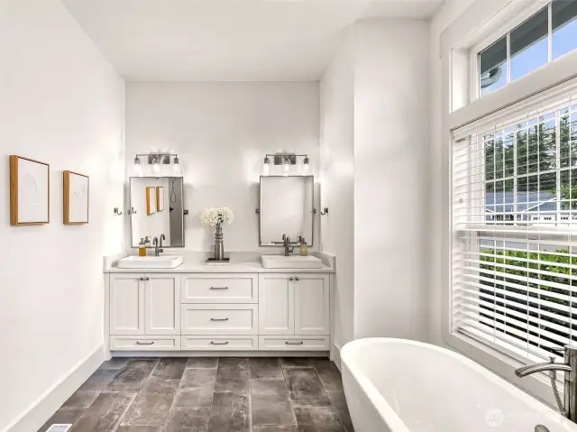 Primary bath, with 2 sinks and soaking tub.