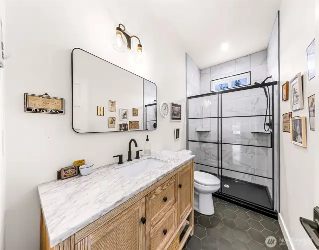 Spacious main floor bath in ADU.