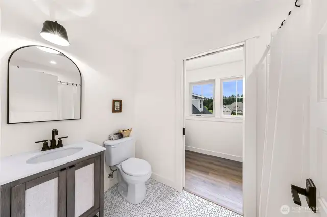 Upper full bath and walk in closet in ADU.