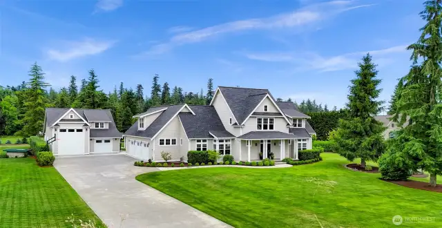Home is situated nicely on the lot. 3 car garage plus a garage for ADU and a RV garage.
