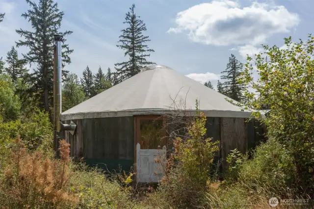Back to SQ...Across the creek on your left is the yurt, shower, and greenhouse