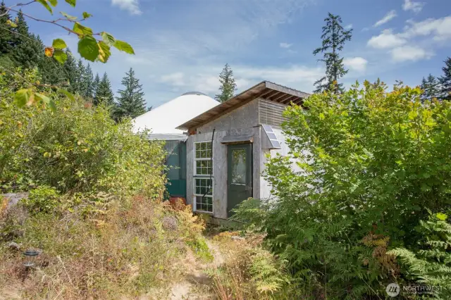 Side entry to shower area of yurt.