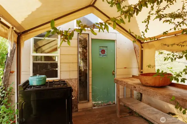 Entry to A-Frame- outdoor propane stove.