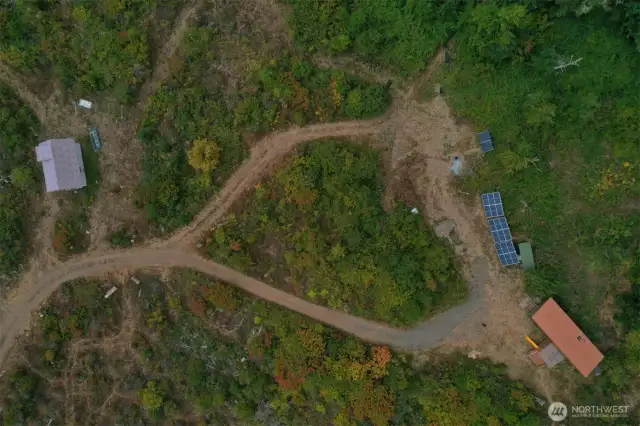 Back out to the road and to your left find the 400SF Cabin awaiting your finishing touches and tiny house.