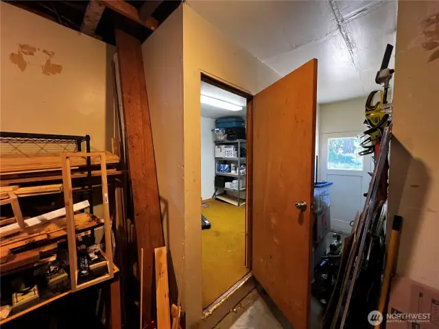 Finished storage room within garage.
