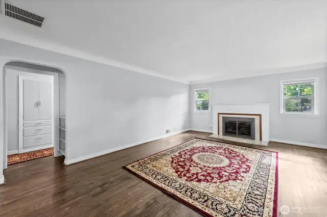 Living Room with Fire Place and Wood Floors