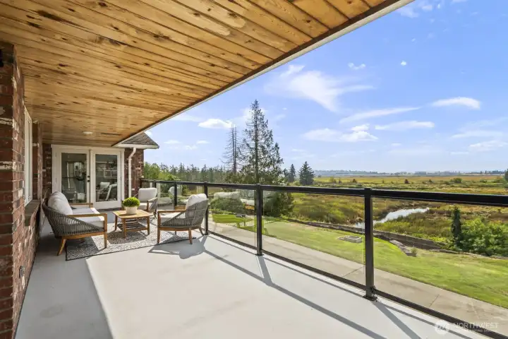 Main floor deck with glass railings