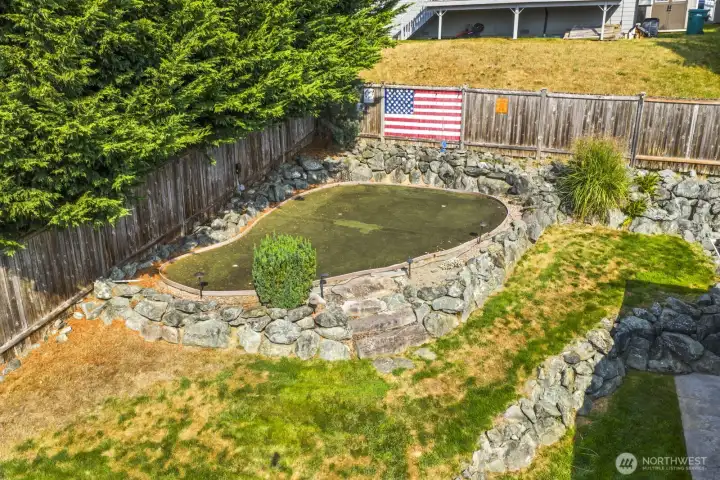 Putting green in the side yard