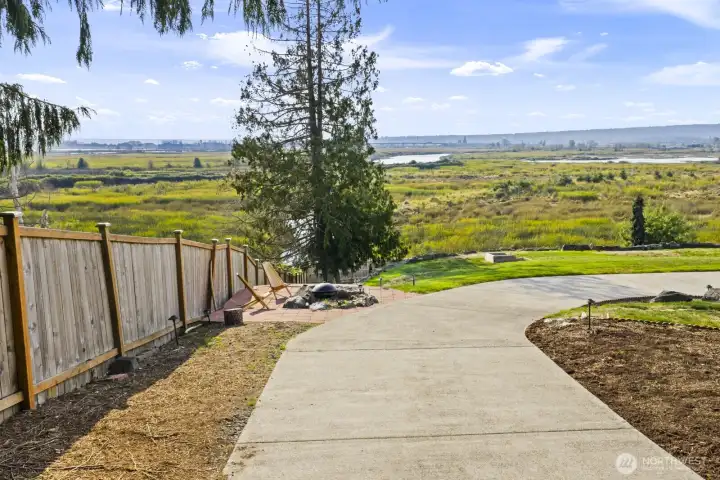 Driveway to the lower level with additional 2 car garage