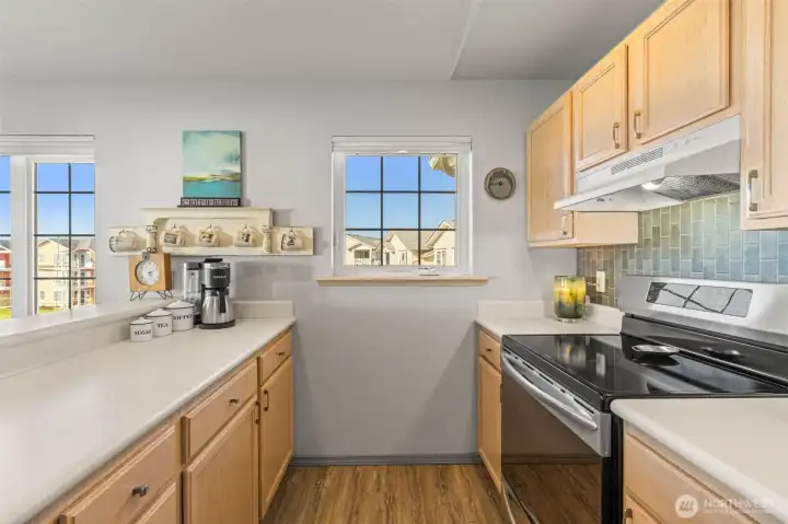 Functional kitchen with newer stainless steel appliances