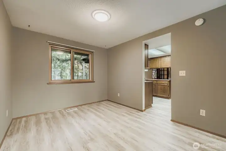 The formal dining room overlooking the backyard adjacent to the kitchen