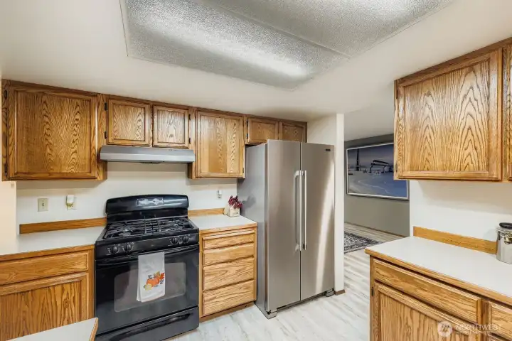 Gas Stove with a hood, lots of counterspace.