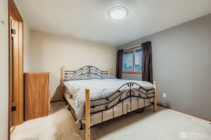 Spacious primary bedroom with it's private ensuite bathroom