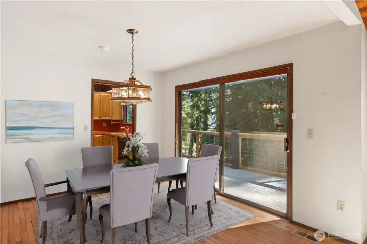 The dining area, with the kitchen in the background.