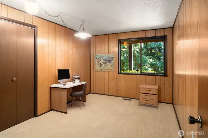 The second guest bedroom can be used as a den, a bedroom, or however you want to use it.