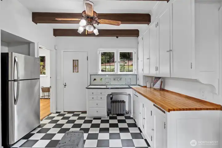 The kitchen offers plenty of space to modernize yet still keep with the design of the era.