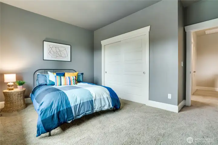 All rooms are roomy and bright and this closet has a built in closet system as well