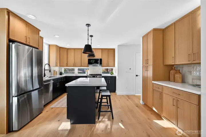 Warm cabinets and south facing windows below the cabinets. How cool is that?!