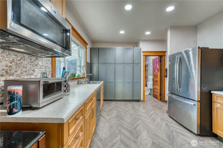 New built in pantry cabinets and main floor bath room off kitchen.