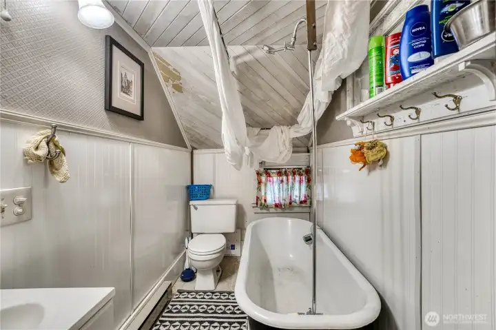 Upstairs bathroom with claw foot tub adds some classic charm.