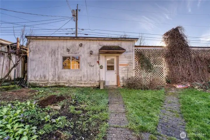 Large one car garage with additional shop space.  Such a great addition to this home.