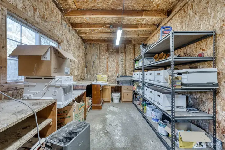 Additional shop space off of garage.  Who wouldn't want this additional space?