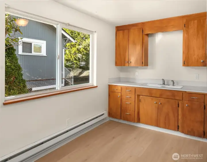 Formica countertops & wooden cabinetry